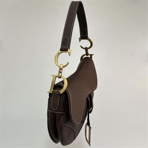 vintage dior saddle bag brown|Dior horse saddle bag history.